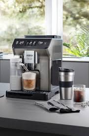 Stunning bean to cup coffee machine with travel mug
