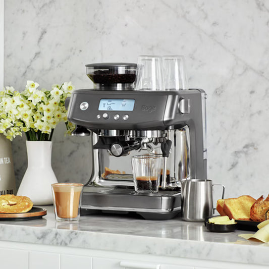 Sage Barista Pro Refurbished Coffee Machine with cups and espresso around it